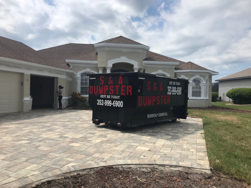 Landscaping waste removal dumpster rental Spring Hill